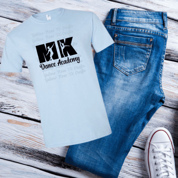 light blue MK Dance Academy shirt featuring dancer silhouette design