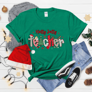 Holly Jolly Teacher Christmas shirt mockup on green shirt – cute Christmas teacher graphic tee for holiday outfits.